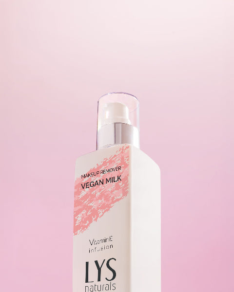 Makeup remover bottle with 'LYS naturals' on a pink background