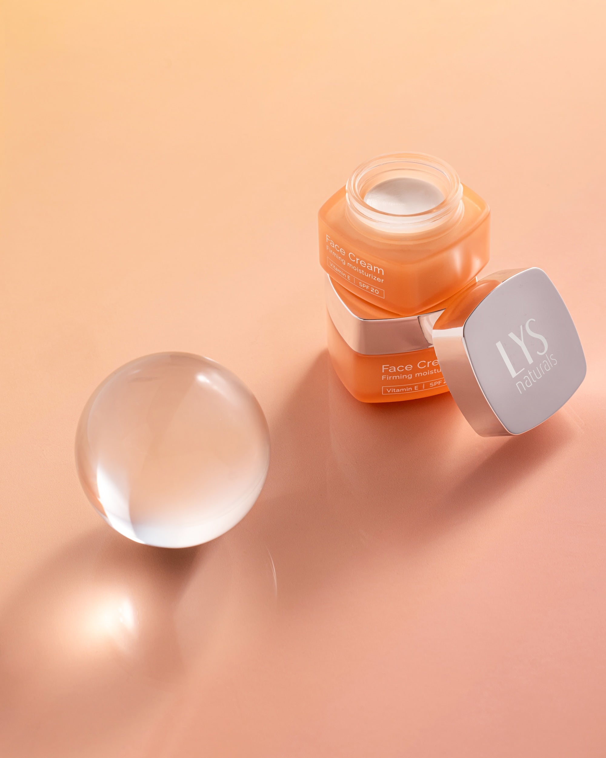 LYS Naturals Face Cream jar on a peach background